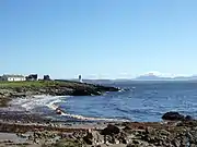 Looking north from Port Charlotte across the loch to Jura