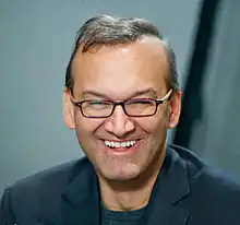 Jha smiling