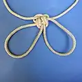 Prusik handcuffs, locked with an overhand knot