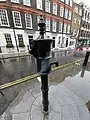 A picture showing the new location of the replica pump the handle of which John Snow removed.