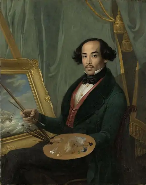 Image 9Raden SalehPainting: Friedrich Carl Albert SchreuelRaden Saleh (1811–1880) was a Romantic painter of Arab-Javanese ethnicity from the Dutch East Indies (now Indonesia). Born in Semarang, in 1829 he was sent to the Netherlands to study portraiture and landscape painting under artists such as Cornelis Kruseman and Andreas Schelfhout. Upon returning to Java in 1851, Saleh focused predominantly on the day-to-day lives of the Javanese, although he also completed his magnum opus, The Arrest of Pangeran Diponegoro, in this period.This painting, though long thought to be a self-portrait, is now attributed to Friedrich Carl Albert Schreuel, a German artist whom Saleh knew during his time in Europe.More selected pictures