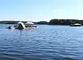 Raft carrying tourists to lake Oberpfuhl