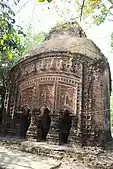 Bhalia: The at chala Raghunath temple (in picture), built in 1772, with terracotta relief.