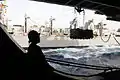 Moving pallets into the hangar of a Nimitz-class aircraft carrier in 2009.