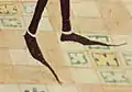 Long poulaines of the mid-15th century; pattens could be worn to protect shoes such as these when outdoors. (Detail of a 15th-century illuminated manuscript of Renaud de Montauban)