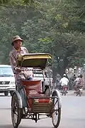 A cycle rickshaw driver in Phnom Penh, Cambodia.