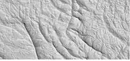 Close-up of a complex group of ridges.  The ridges may be the remains of old streams and/or linear ridge networks.  Image taken by HiRISE under the HiWish program.