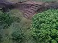 Rockcut steps to a large cistern pavurallakonda
