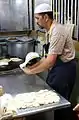 Roti prata being prepared.