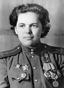 Portrait photograph of Rufina Gasheva in uniform, wearing the gold star medal of a Hero of the Soviet Union.
