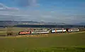 test run of tilting double-deck coach pulled by a regular train