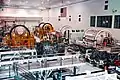 Overview of the high bay factory floor filled with space station modules