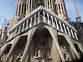 .mw-parser-output span.smallcaps{font-variant:small-caps}.mw-parser-output span.smallcaps-smaller{font-size:85%}iesus nazarenus rex iudæorum on the side of the Sagrada Familia