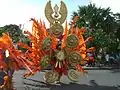 A costumed carnival dancer.