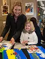 Lower School students and parents work on art projects at the Tobin Fine Arts School at Saint Mary's Hall.