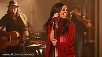 A view of Sara Evans performing in concert.