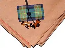 Image 26Wood Badge beads and neckerchief. Wood Badge is the premier Boy Scout adult leader training course. A holder of the Wood Badge is a leader highly trained and dedicated Scout leader.