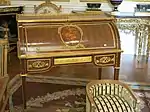 Roll-top desk of Marie-Antoinette; by Jean-Henri Riesener; 1784; oak and pine frame, sycamore, amaranth and rosewood veneer, bronze gilt; 103.6 x 113.4&nbsp;cm; Louvre