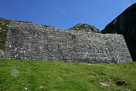 A wall in front of the Sunniva Church