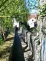 The Passage des Carmes between the old convent and the Nonette, on the medieval rampart.
