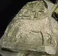 Shrine Stone: A horse with what may be a mason's tools above