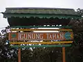 Wooden signboard at the peak. The roof has been torn off due to severe weather in recent years