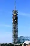 Ground-level view of a cluttered lattice structure