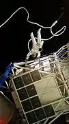 A mannequin alongside the Skylab 1-G Trainer telescope at Manned Space Center, Houston.