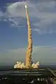 Launch of Space Shuttle Atlantis viewed from the top of the Vehicle Assembly Building