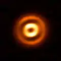By observing dusty protoplanetary discs, scientists investigate the first steps of planet formation.