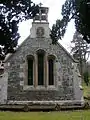 Stained glass windows and belfry.
