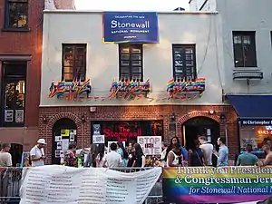 The Stonewall Inn in Greenwich Village, a designated U.S. National Historic Landmark and National Monument, as the site of the June 1969 Stonewall riots and the cradle of the modern gay rights movement.