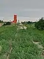 Both of Stoughton's grain elevators along-side the railway