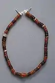 String of beads; 3300–3100 BC; carnelian, garnet, quartz and glazed steatite; length: 20.5&nbsp;cm; by Naqada III culture Metropolitan Museum of Art