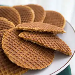 Stroopwafels (syrup waffles) are a treat consisting of waffles with caramel-like syrup filling.