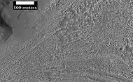 Complex surface around mound in Deuteronilus Mensae, as seen by HiRISE, under the HiWish program.  Location of this image is in the black box labeled B in the CTX image above.
