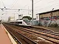 TGV Sud-Est on a service to northern France, wearing the final Carmillon livery, September 2012