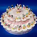 Favor Cake with 40 carton boxes with Minnie Mouse and Daisy Duck figurines, for birthday or Christening