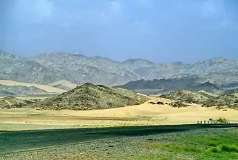 A view of Taif with a road at the foreground and mountains at the background. Muhammad went there to preach Islam