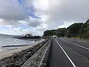 Looking east to Takaparawhau showing Tamaki Yacht Club where Bastion Rock was removed, 2022.
