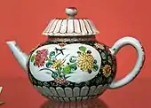 Teapot, porcelain painted in colored enamels (famille rose style). Qing Dynasty, 1725-1775 CE. From Jingdezhen, Jiangsu Province. Victoria and Albert Museum, London