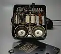 Image 2Rotary dial telephone, probably from Belgium; the circuit diagram inside is in Dutch and French