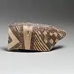 Terracotta rim of a bowl; 3800-3300 BC; terracotta; length: 12.8 cm (5.mw-parser-output .frac{white-space:nowrap}.mw-parser-output .frac .num,.mw-parser-output .frac .den{font-size:80%;line-height:0;vertical-align:super}.mw-parser-output .frac .den{vertical-align:sub}.mw-parser-output .sr-only{border:0;clip:rect(0,0,0,0);clip-path:polygon(0px 0px,0px 0px,0px 0px);height:1px;margin:-1px;overflow:hidden;padding:0;position:absolute;width:1px}1⁄16 in.); Metropolitan Museum of Art