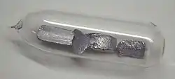 Image: Thallium pieces stored in a glass ampoule under argon atmosphere