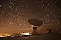 The IRAM 30-meter telescope scanning the night sky