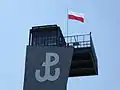 The Kotwica on the observation tower of the Warsaw Uprising Museum.