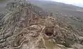 Top of the mountain showing half side of the fortification (Arabic: حِصْن ٱلْغُرَاب, romanized:&nbsp;Hiṣn Al-Ghurāb)