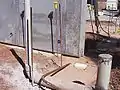 Base detail of tilt-slab sat on strip footings.  Finished floor level will be approx. 75mm higher than blue inserts. Inserts take threaded rebar into floor slab.