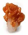 Tinzenite on Calcite,  4.5 × 3.5 × 3&nbsp;cm.  Wessels Mine, Kalahari manganese fields, Northern Cape Province, South Africa