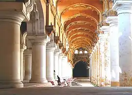 Pillared halls of a historic building.